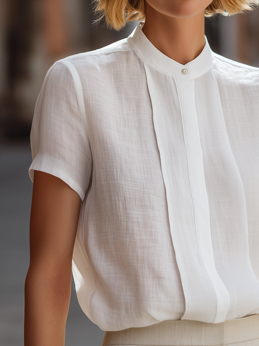 Structured Short Sleeve Stand Collar Blouse With Pleated Front Panel